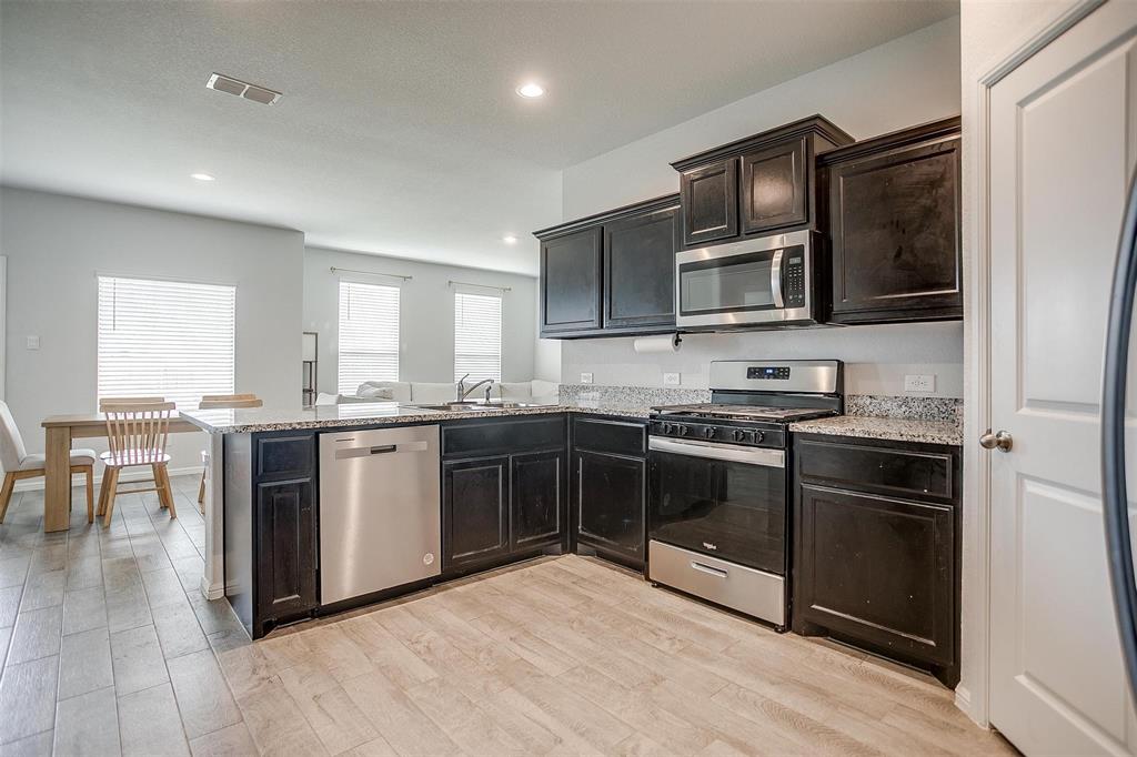 9721 Cherryville Road Fort Worth, TX 76108 - Photo 1 of 23 Spacious kitchen with lots of counter space.