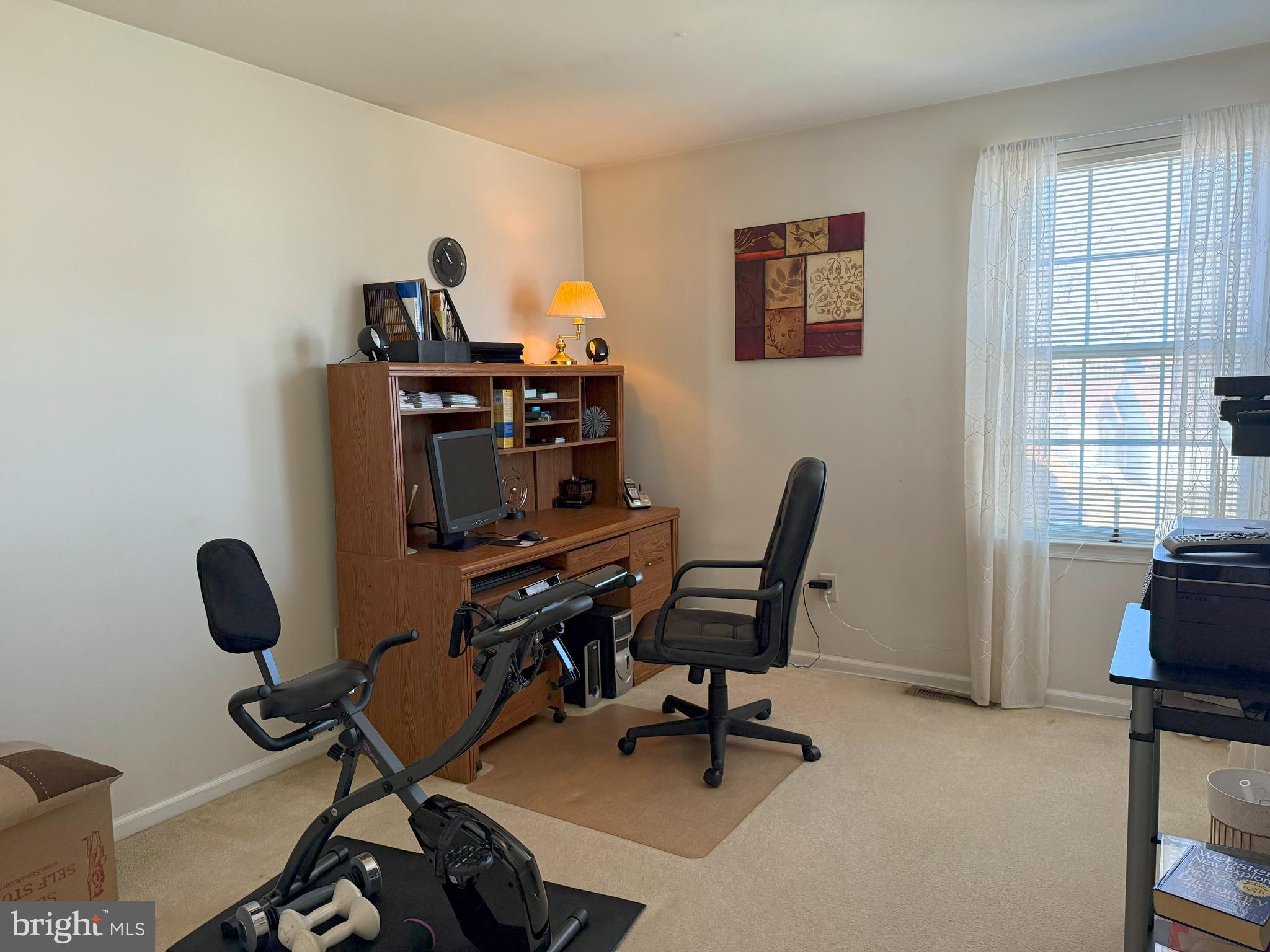 22 Chilmark Court Bear, DE 19701 - Photo 16 of 29 a view of a workspace with furniture and a window