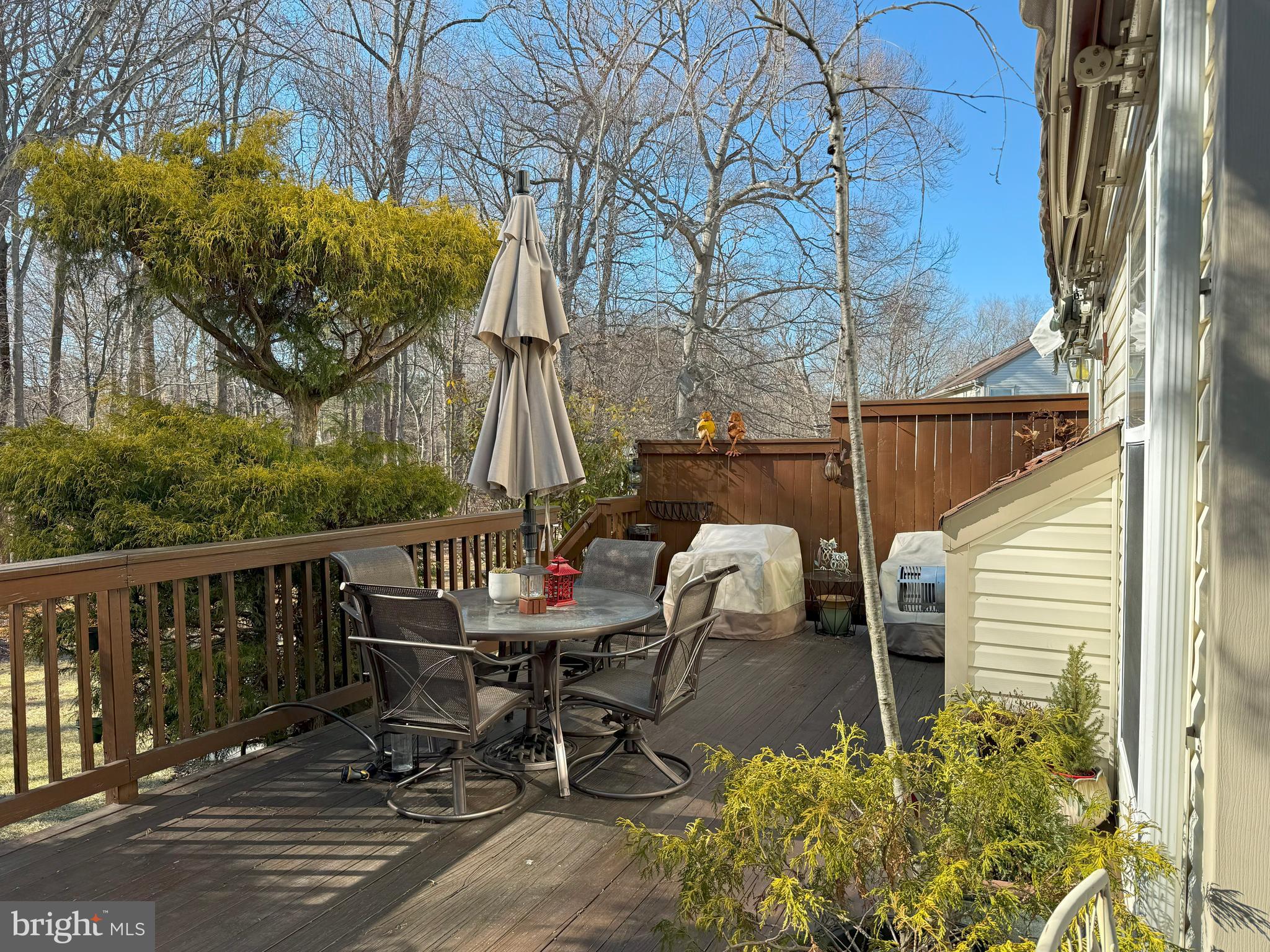 22 Chilmark Court Bear, DE 19701 - Photo 27 of 29 a view of balcony with wooden floor and outdoor seating