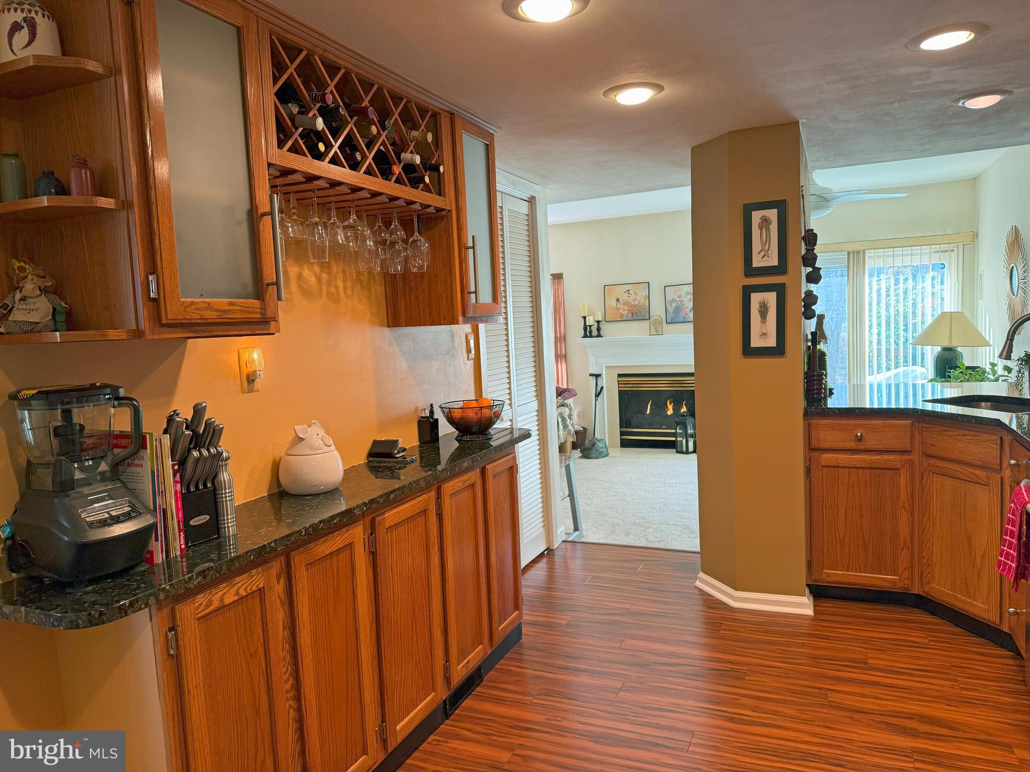 22 Chilmark Court Bear, DE 19701 - Photo 7 of 29 a kitchen with sink refrigerator and wooden floor