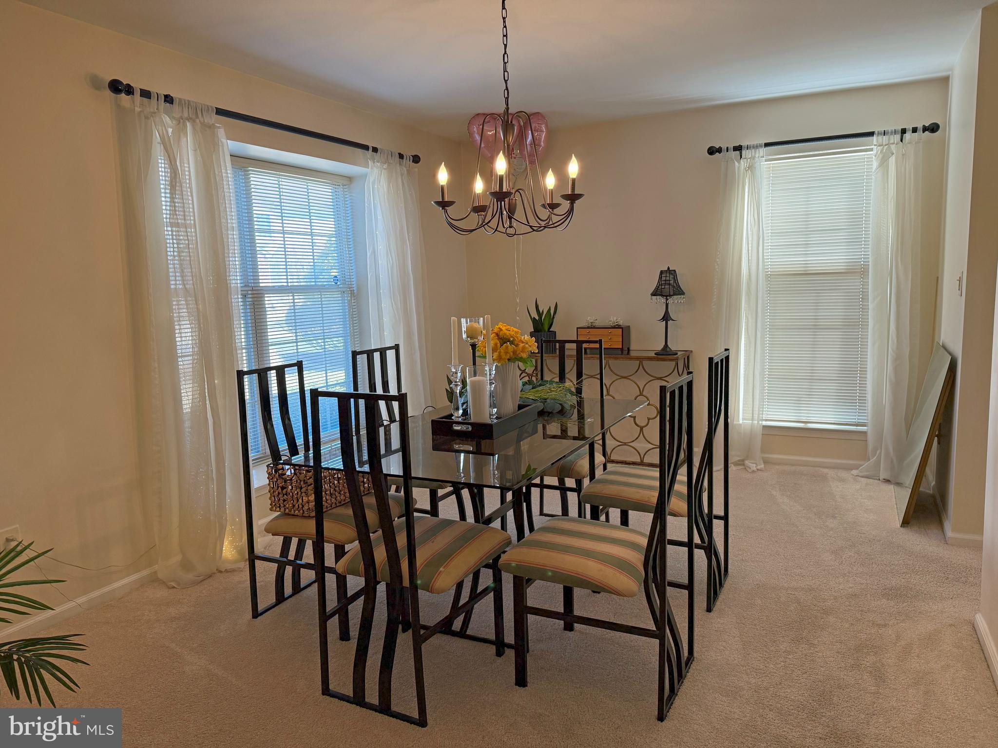 22 Chilmark Court Bear, DE 19701 - Photo 8 of 29 a view of a dining room with furniture and a chandelier