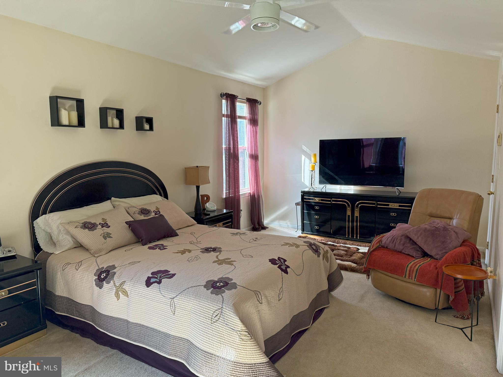 22 Chilmark Court Bear, DE 19701 - Photo 10 of 29 a bedroom with a bed and a flat screen tv
