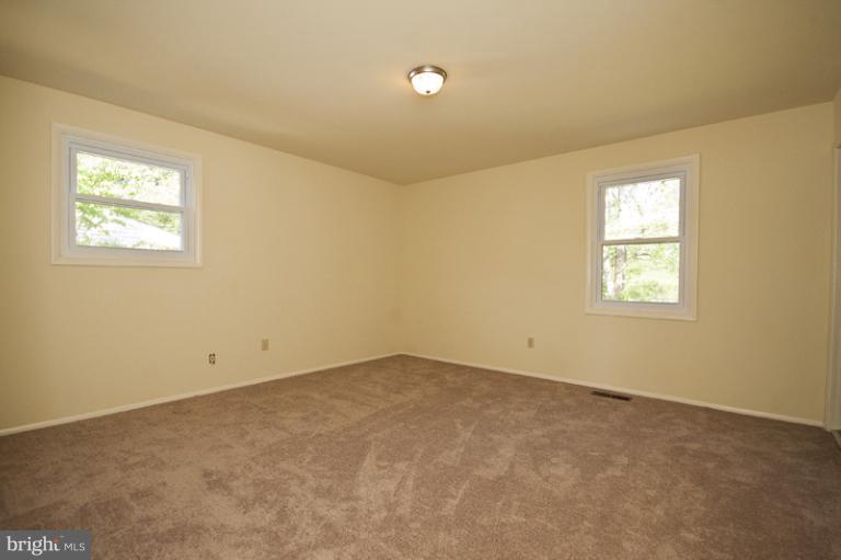 3912 Sybil Road Randallstown, MD 21133 - Photo 16 of 18 an empty room with a window