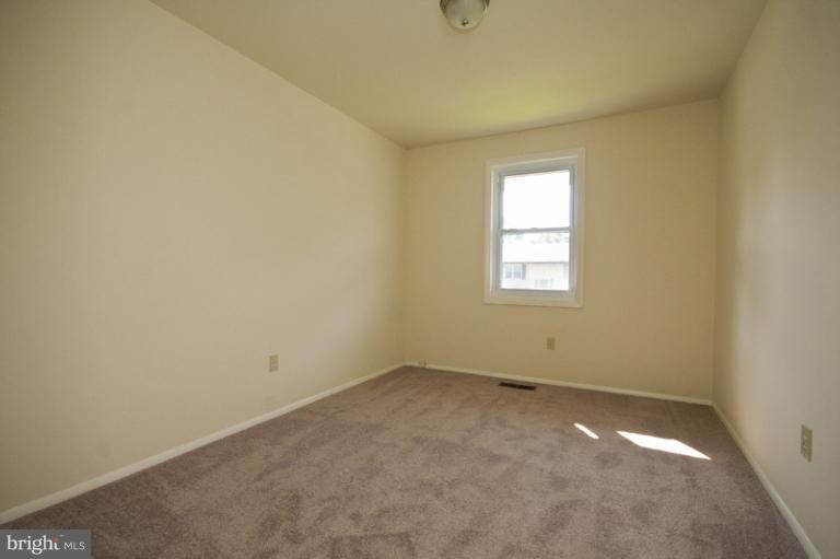 3912 Sybil Road Randallstown, MD 21133 - Photo 3 of 18 an empty room with a window