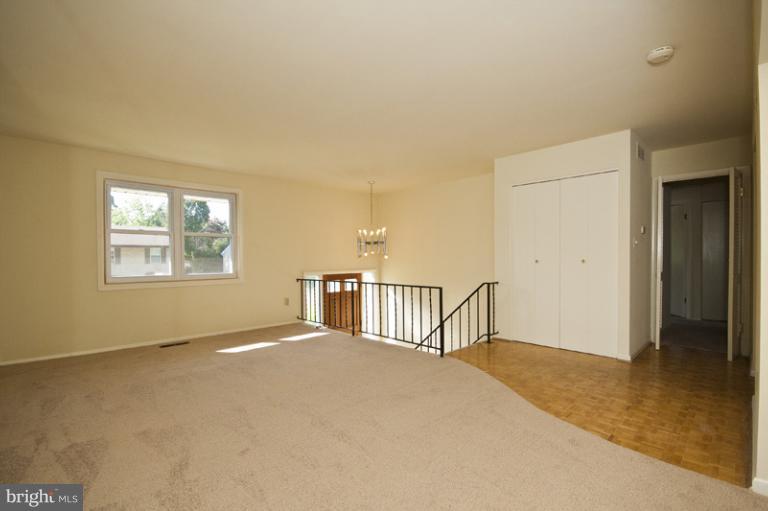 3912 Sybil Road Randallstown, MD 21133 - Photo 6 of 18 a view of an empty room with a window