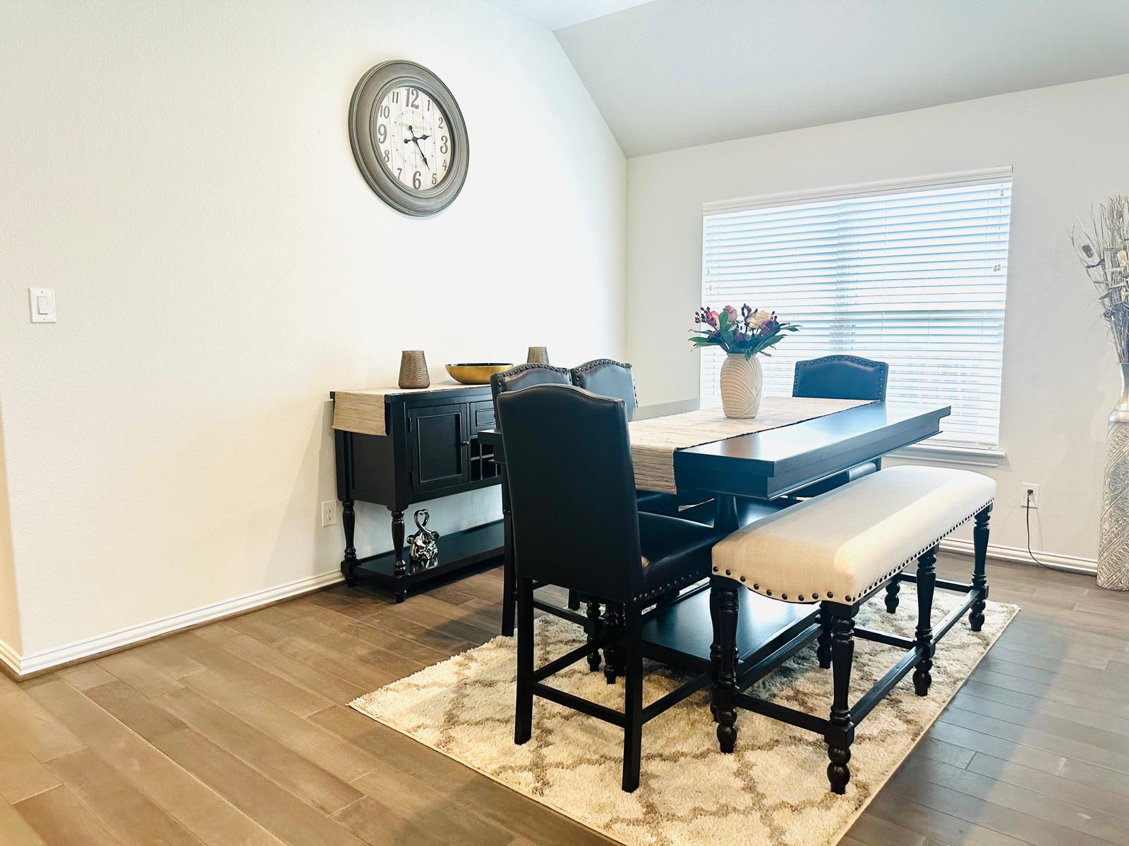 862 Leadtree Loop Buda, TX 78610 - Photo 8 of 40 a view of a dining room with furniture and a window