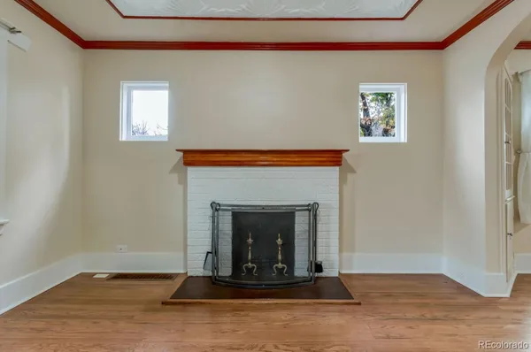 a living room with a fireplace