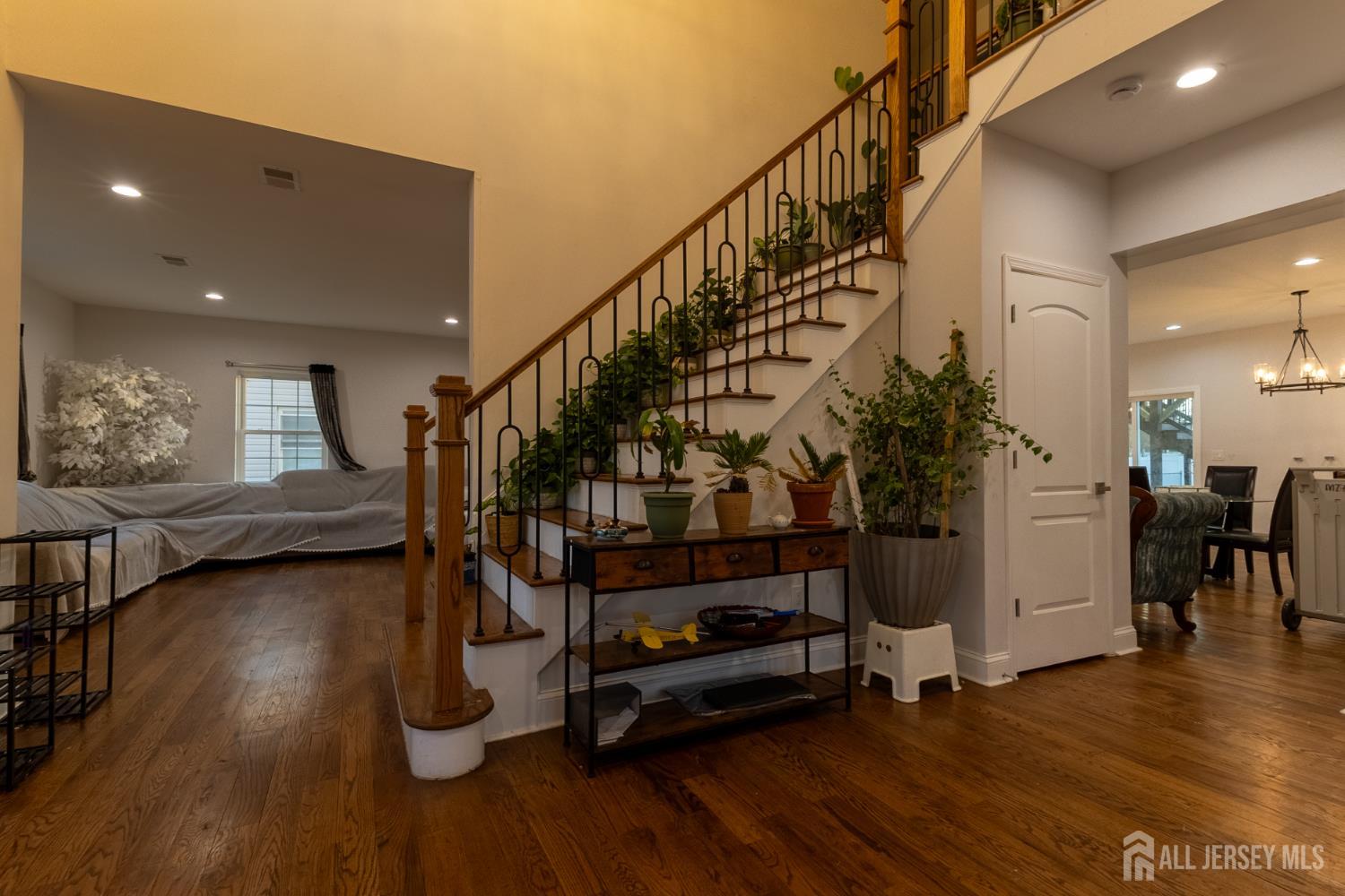 55 Walnut Street Edison, NJ 08817 - Photo 8 of 29 a view of entryway with wooden floor and stairs