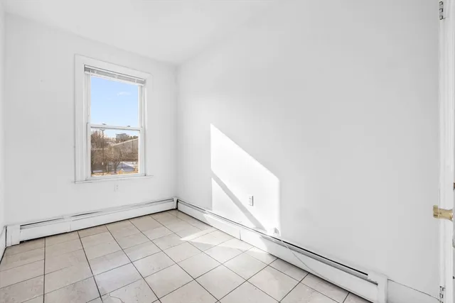 a bathroom with a granite countertop sink mirror and