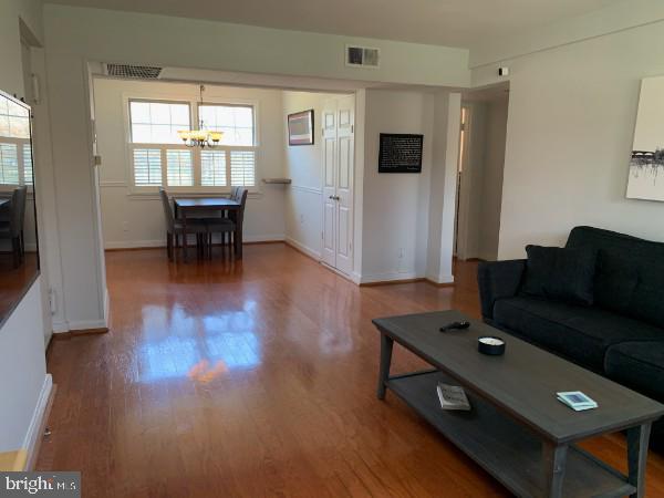 6612 10th Street, Unit A2 Alexandria, VA 22307 - Photo 5 of 41 Open living room and dining area