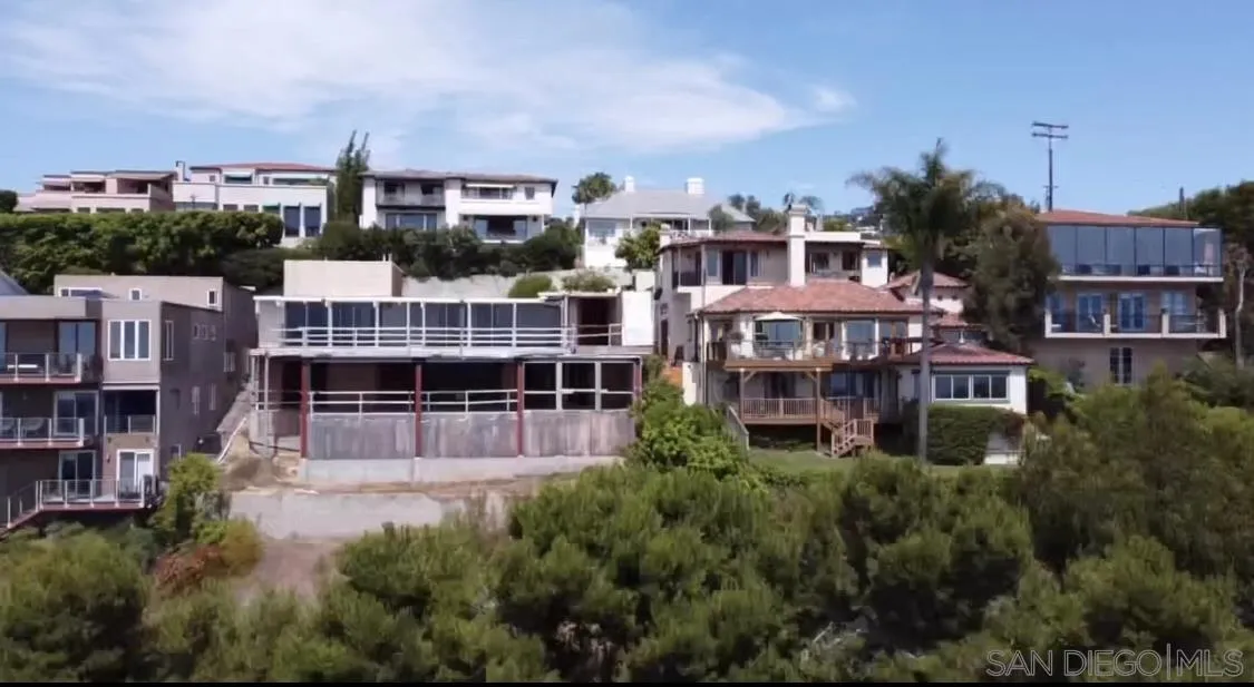 7520 Mar La La Jolla, CA 92037 - Photo 16 of 19 a view of a large building with a yard