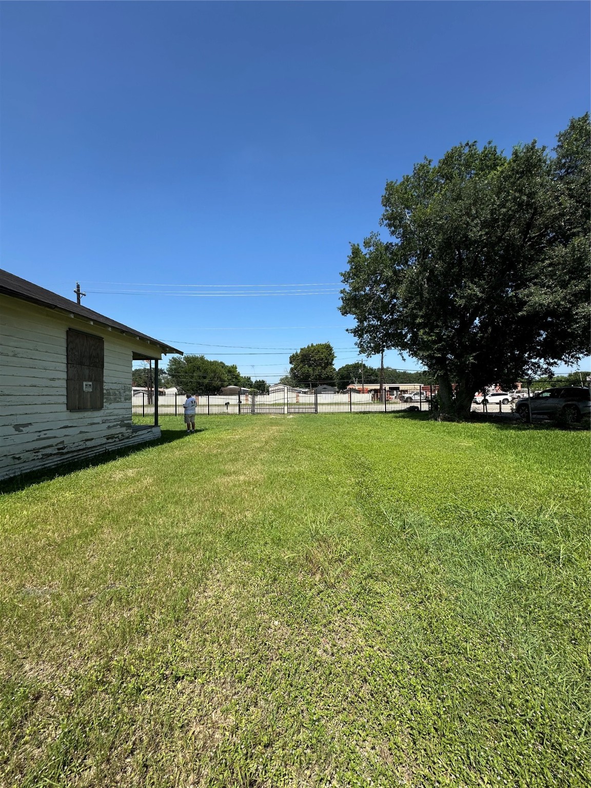 10809 Telephone Road Houston, TX 77075 - Photo 11 of 11 a backyard of a house with lots of green space and outdoor seating