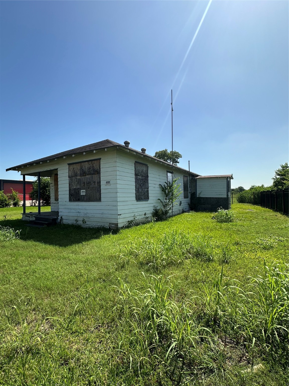 10809 Telephone Road Houston, TX 77075 - Photo 6 of 11 a front view of a house with garden