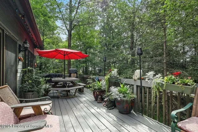 an outdoor space with furniture and umbrella