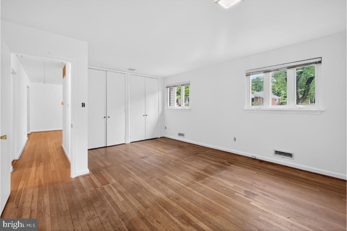 4068 Adams Drive Silver Spring, MD 20902 - Photo 12 of 43 a view of an empty room and wooden floor
