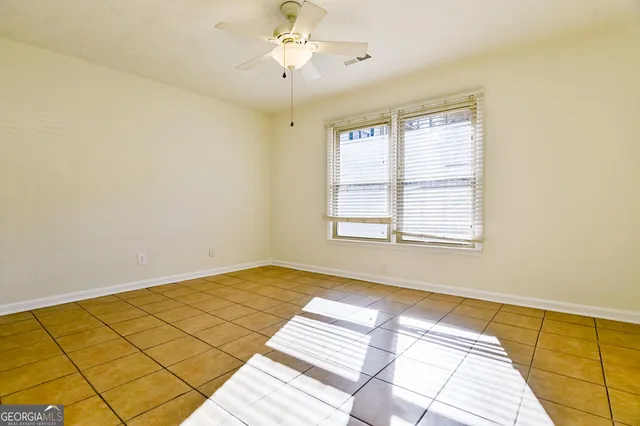 a view of a room with a large window