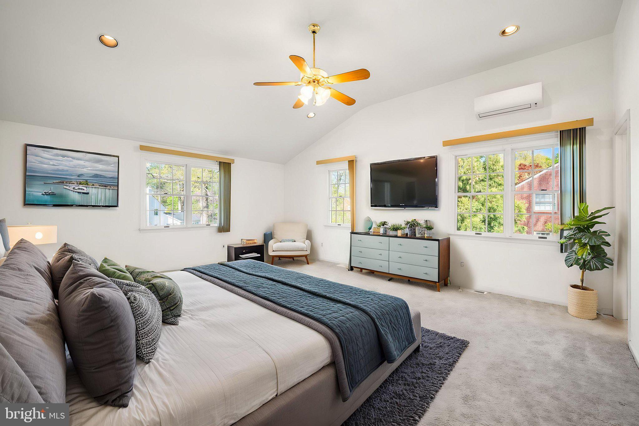 101 East Rose Valley Road Wallingford, PA 19086 - Photo 16 of 38 a bedroom with a large bed and a window