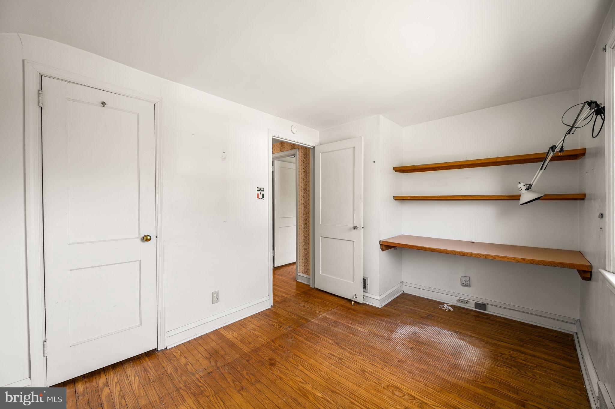 101 East Rose Valley Road Wallingford, PA 19086 - Photo 25 of 38 a view of a room with wooden floor and cabinet