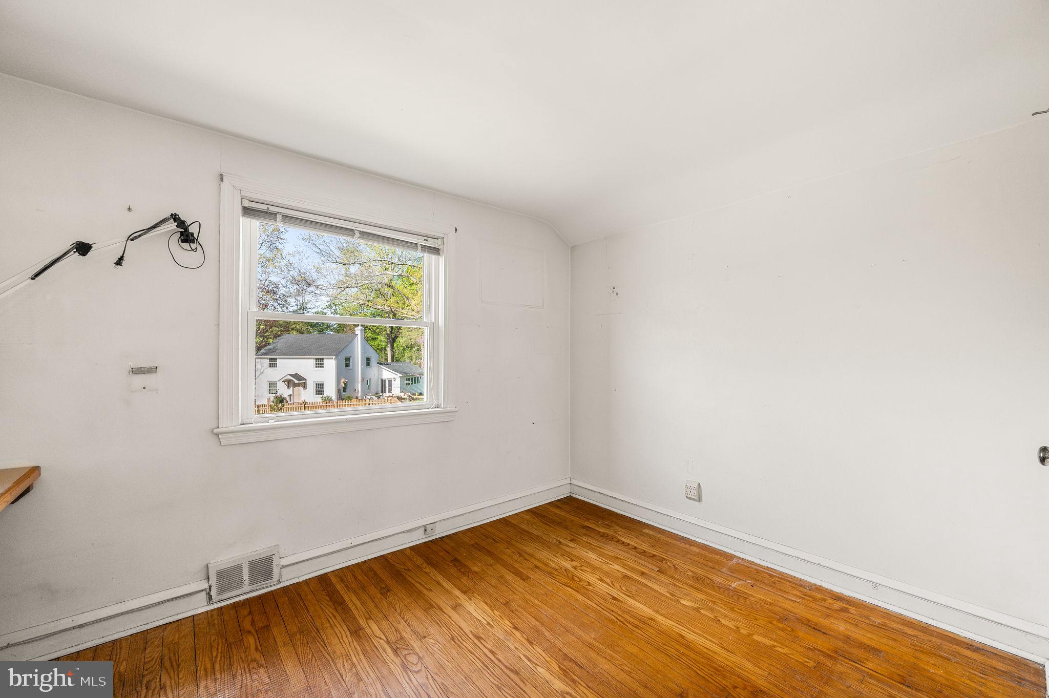 101 East Rose Valley Road Wallingford, PA 19086 - Photo 26 of 38 an empty room with a window