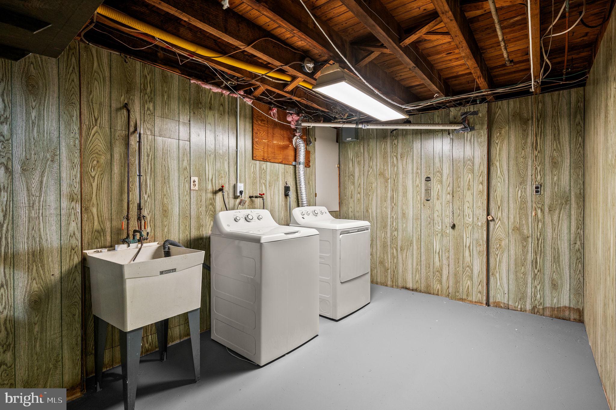 101 East Rose Valley Road Wallingford, PA 19086 - Photo 29 of 38 a utility room with dryer and washer