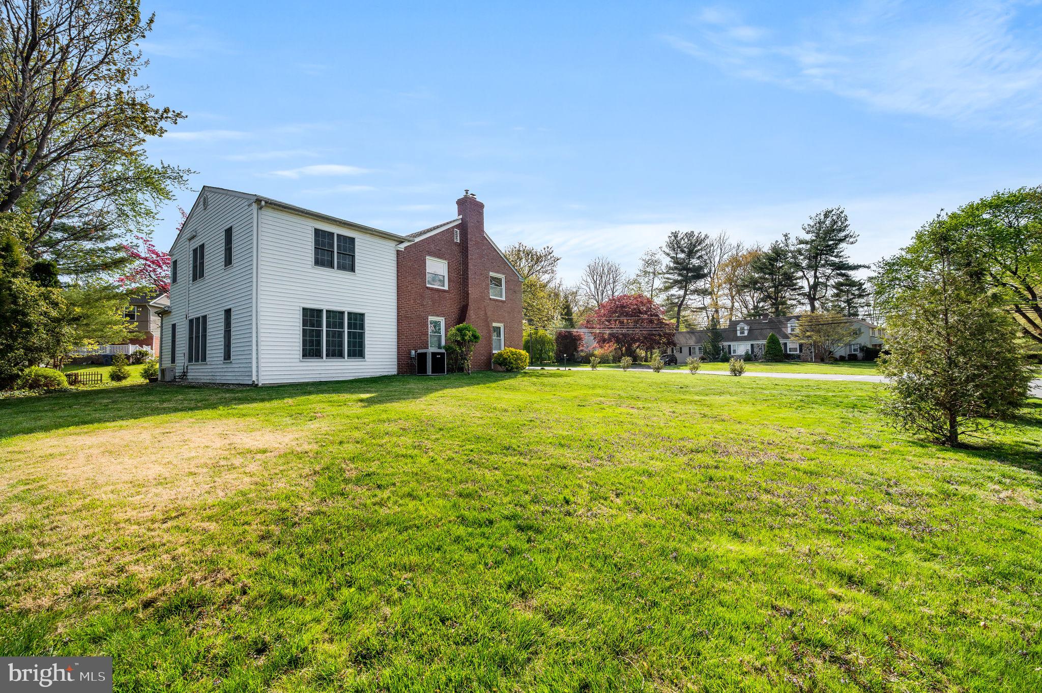 101 East Rose Valley Road Wallingford, PA 19086 - Photo 36 of 38 a house view with swimming pool in front of it