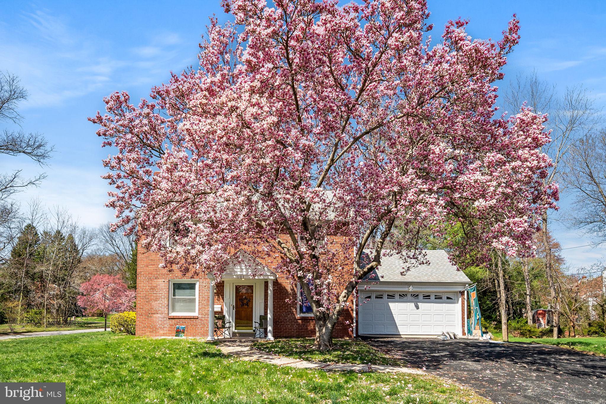 101 East Rose Valley Road Wallingford, PA 19086 - Photo 37 of 38 a front view of a house with a garden