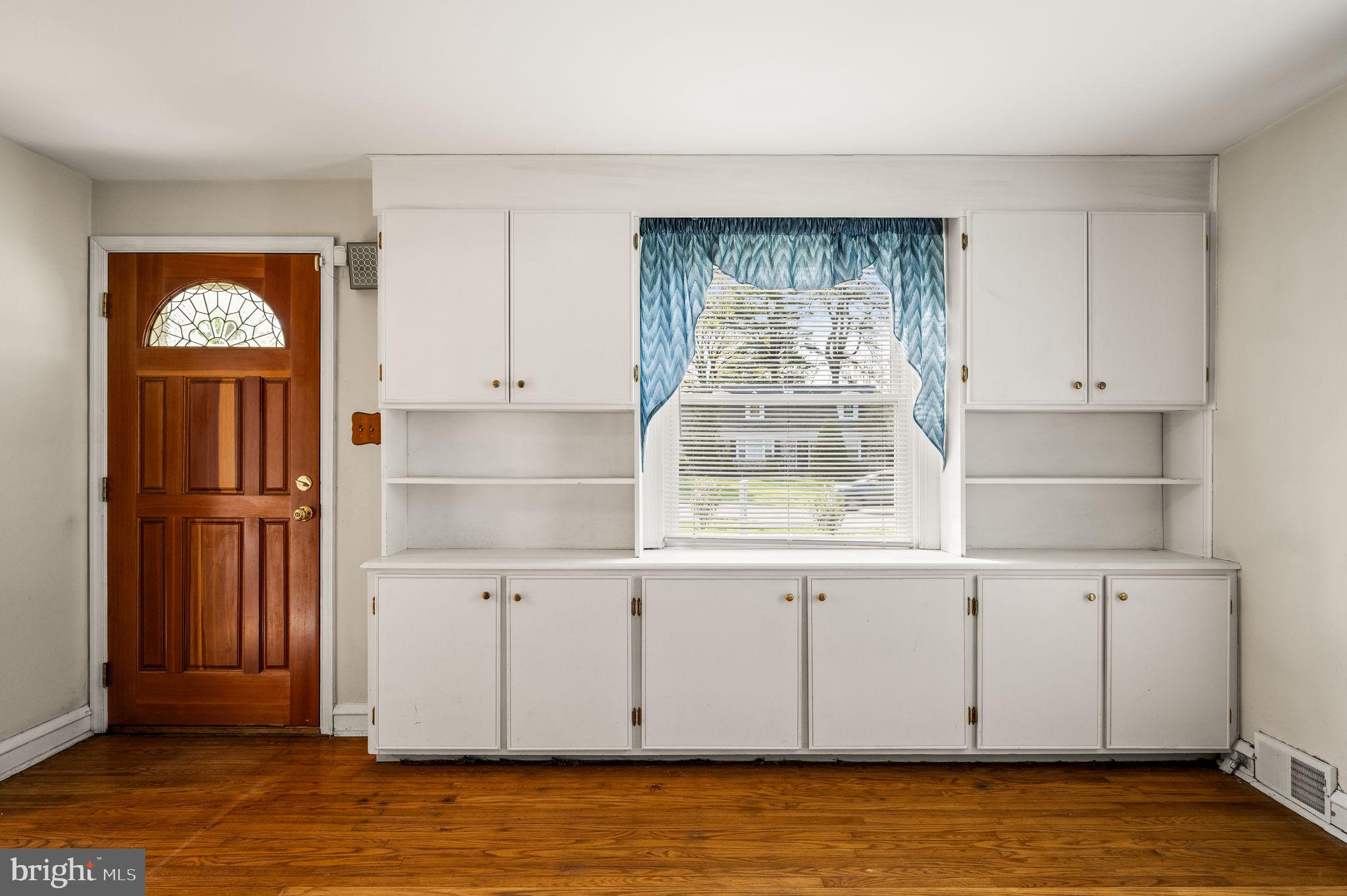 101 East Rose Valley Road Wallingford, PA 19086 - Photo 5 of 38 a view of front door with wooden floor