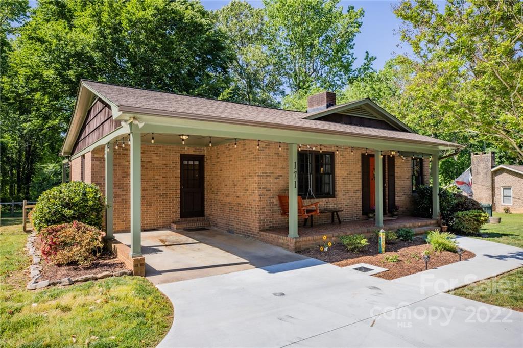 171 Orchard Road Statesville, NC 28677 - Photo 11 of 46 front view of a house with a porch