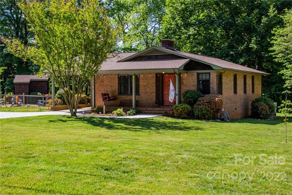 171 Orchard Road Statesville, NC 28677 - Photo 12 of 46 a front view of a house with garden