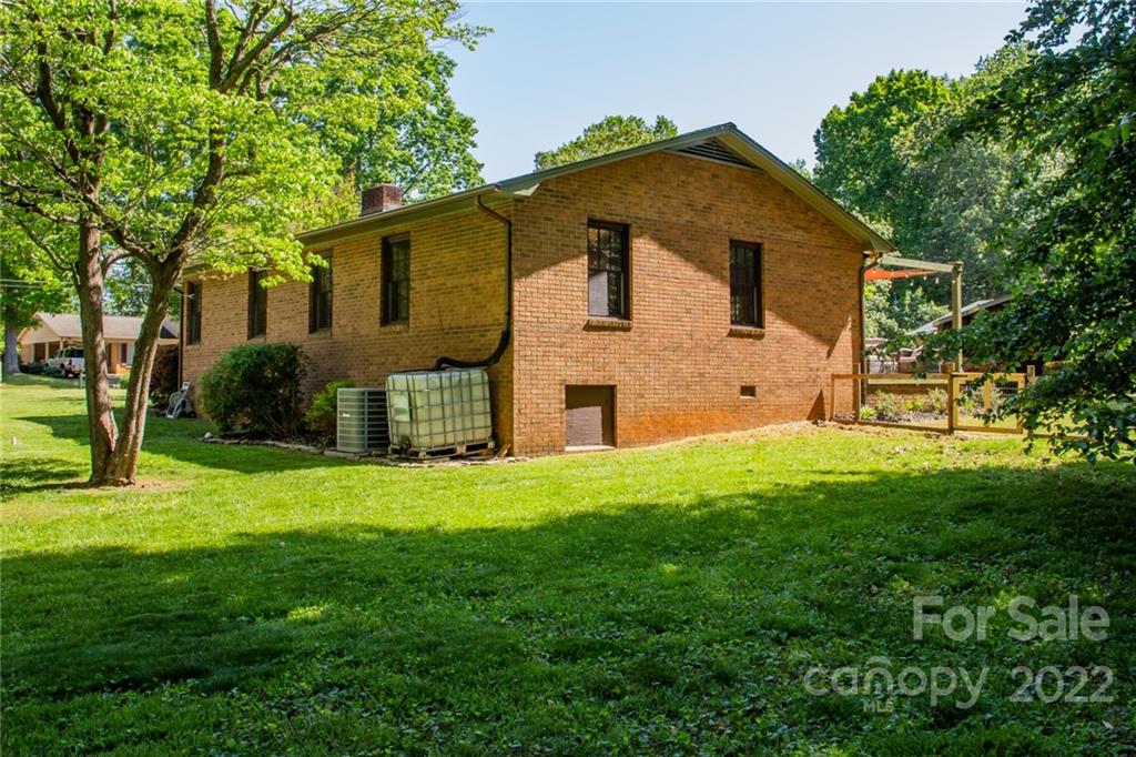 171 Orchard Road Statesville, NC 28677 - Photo 13 of 46 a front view of a house with a yard