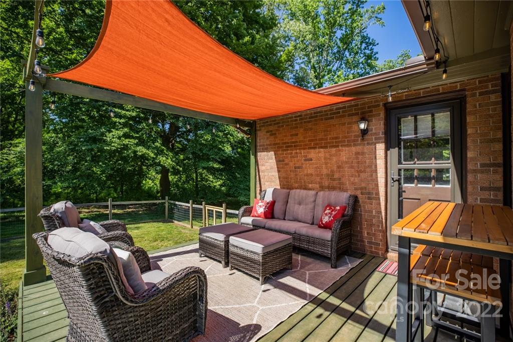 171 Orchard Road Statesville, NC 28677 - Photo 19 of 46 an outdoor sitting area with furniture and garden view