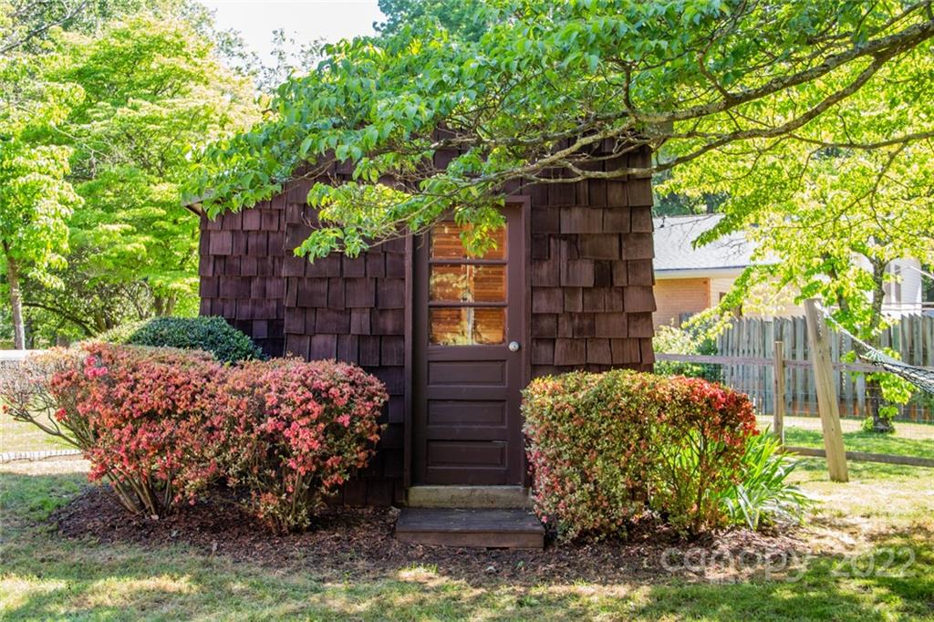 171 Orchard Road Statesville, NC 28677 - Photo 20 of 46 a couple of flower garden and wooden fence