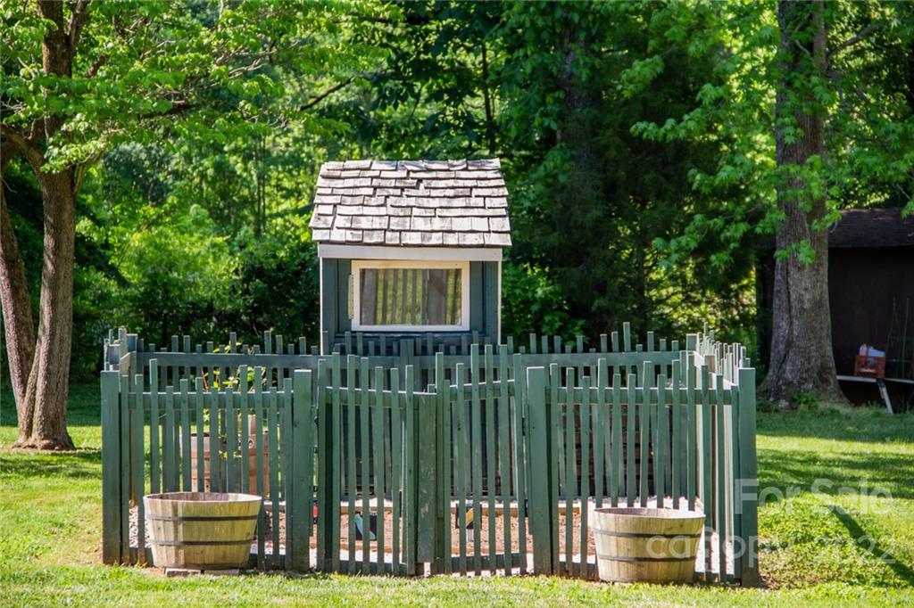 171 Orchard Road Statesville, NC 28677 - Photo 22 of 46 a view of a bench in the garden