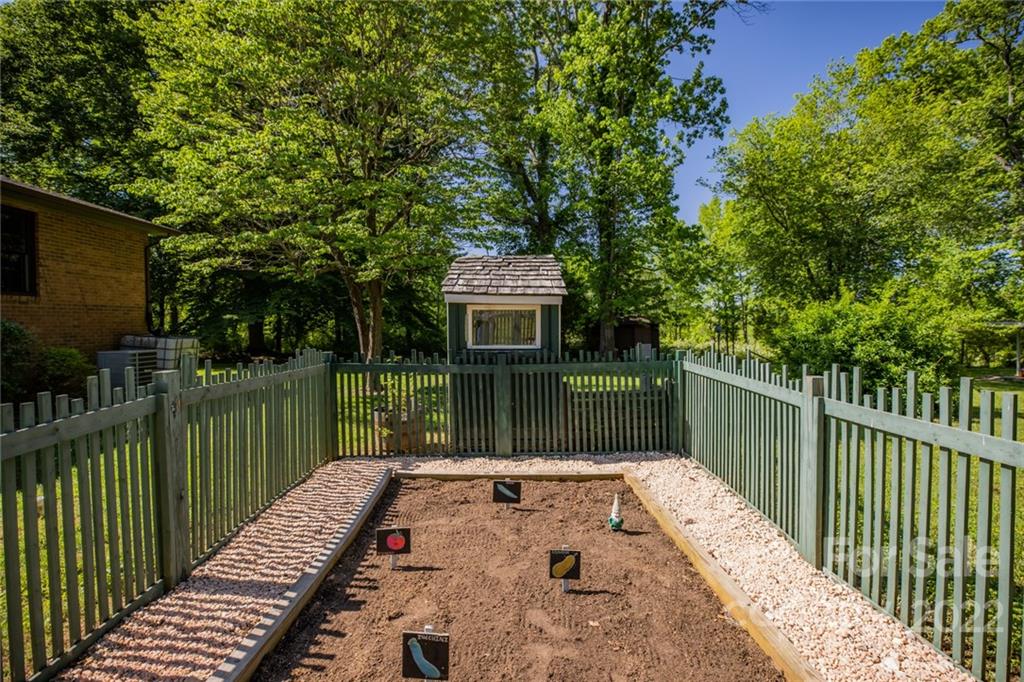 171 Orchard Road Statesville, NC 28677 - Photo 23 of 46 a view of a house with backyard and deck