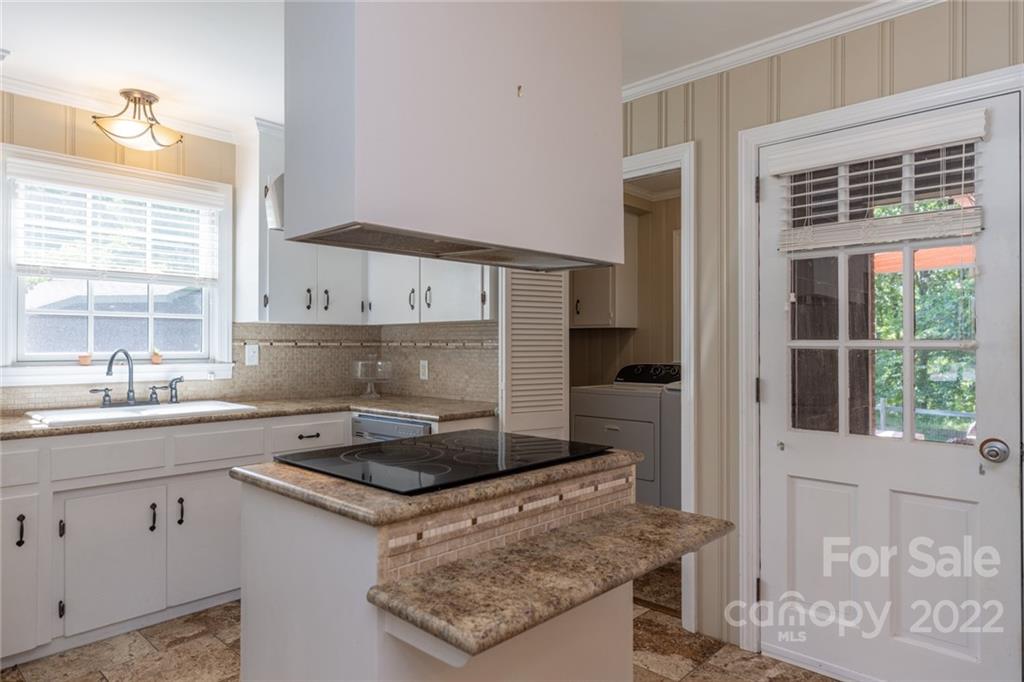 171 Orchard Road Statesville, NC 28677 - Photo 24 of 46 a kitchen with a sink stove and refrigerator