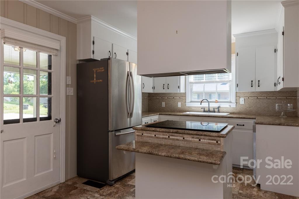 171 Orchard Road Statesville, NC 28677 - Photo 25 of 46 a kitchen with a refrigerator stove and sink
