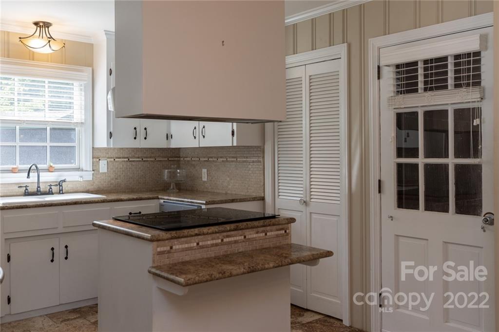 171 Orchard Road Statesville, NC 28677 - Photo 26 of 46 a stove top oven sitting inside of a kitchen