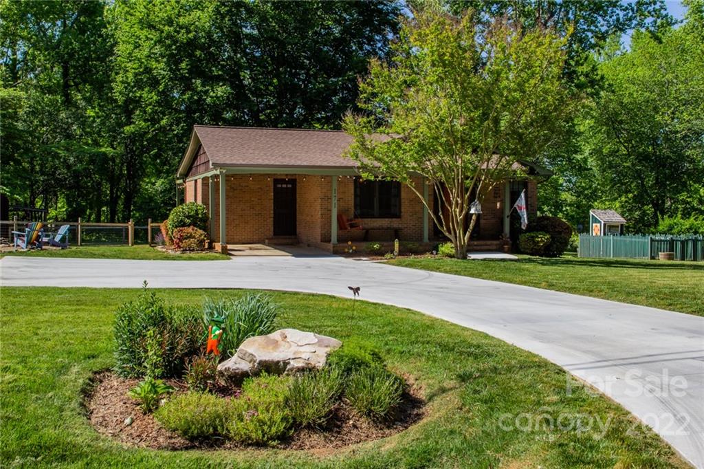171 Orchard Road Statesville, NC 28677 - Photo 4 of 46 a front view of a house with a yard