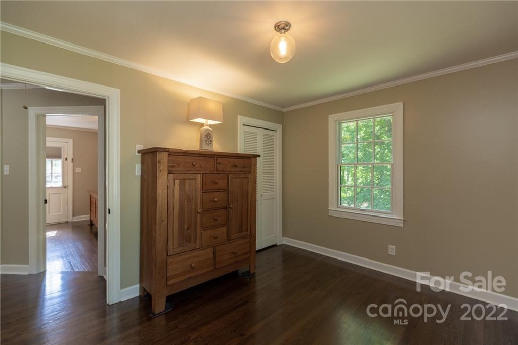 171 Orchard Road Statesville, NC 28677 - Photo 42 of 46 an empty room with wooden floor and windows