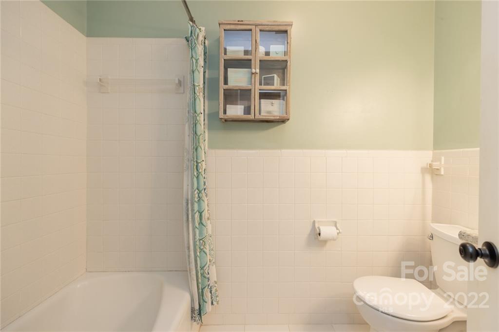 171 Orchard Road Statesville, NC 28677 - Photo 44 of 46 a bathroom with a shower and a toilet