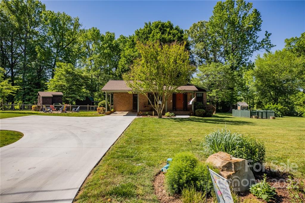 171 Orchard Road Statesville, NC 28677 - Photo 5 of 46 a front view of a house with garden