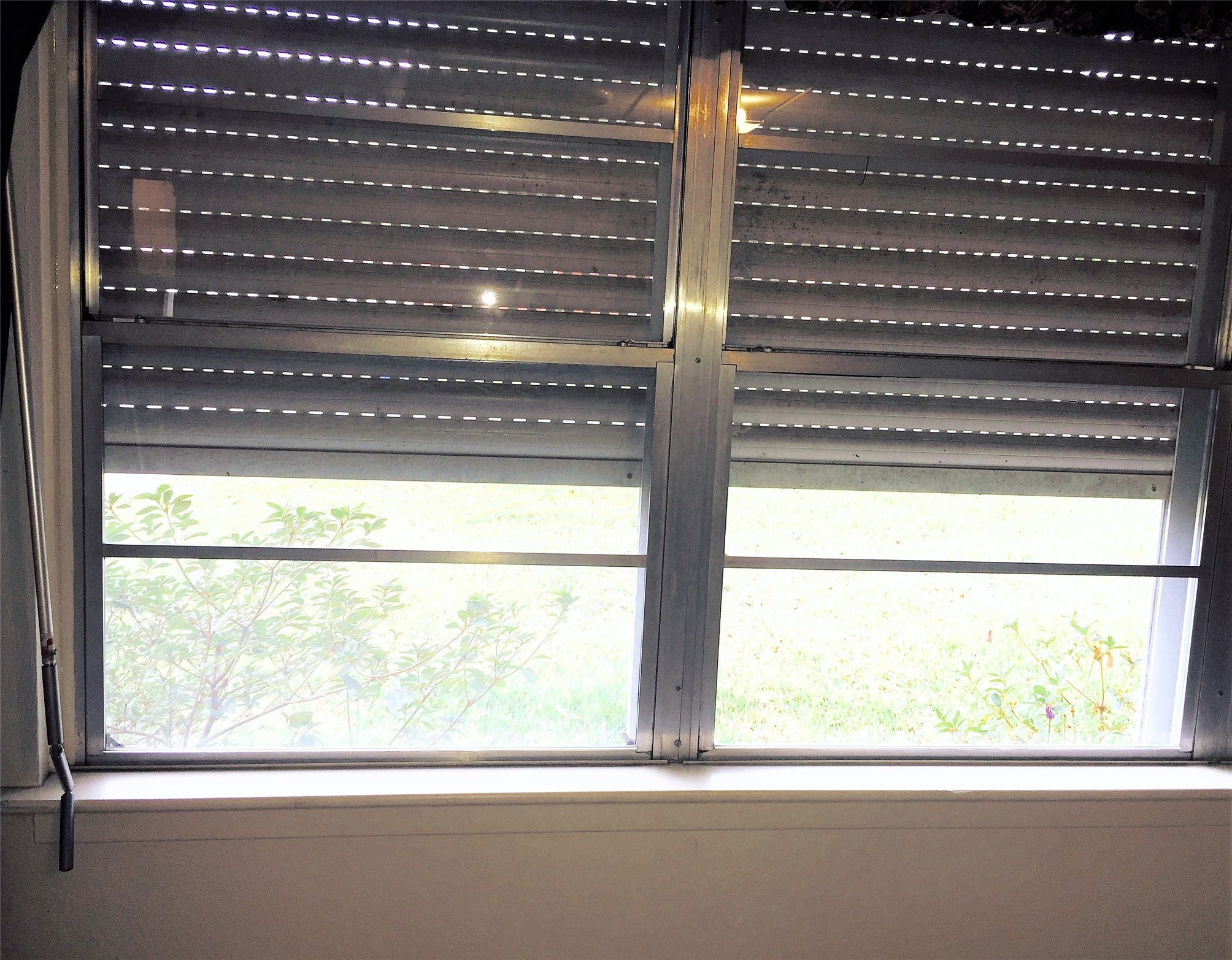 2809 Rosadele Street La Marque, TX 77568 - Photo 8 of 33 Windows have retractable wind shutters...protect yourself while saving on insurance...priceless!