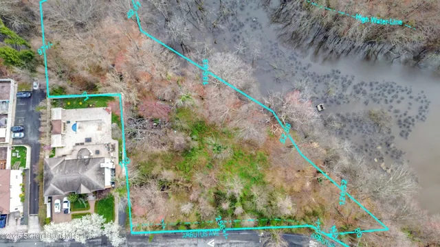 a view of a pathway with a small yard