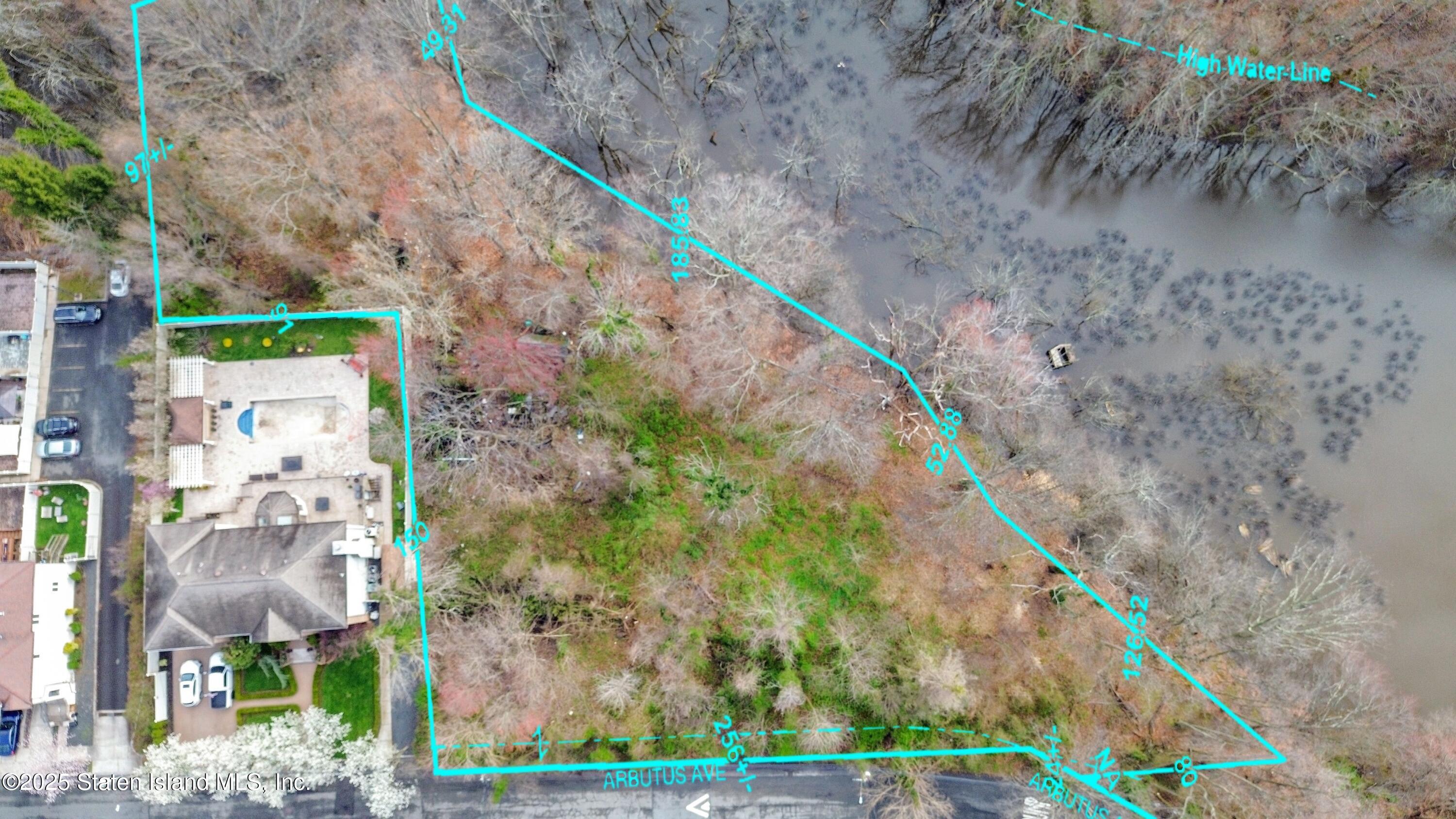 a view of a pathway with a small yard