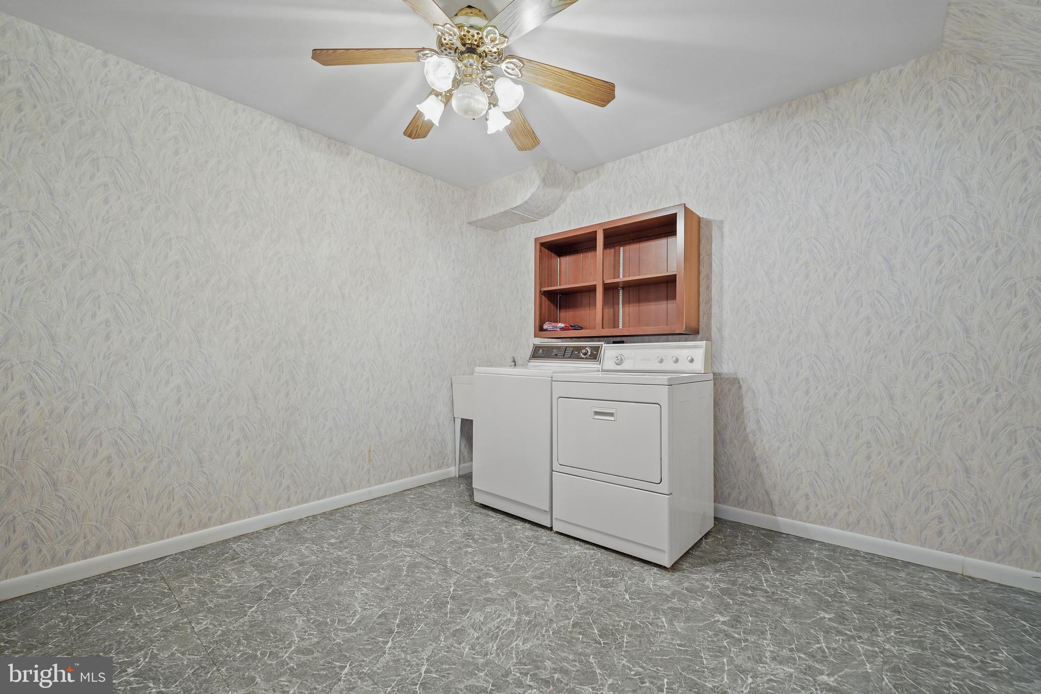 14400 Sandy Ridge Road Silver Spring, MD 20904 - Photo 48 of 62 Spacious Laundry Room