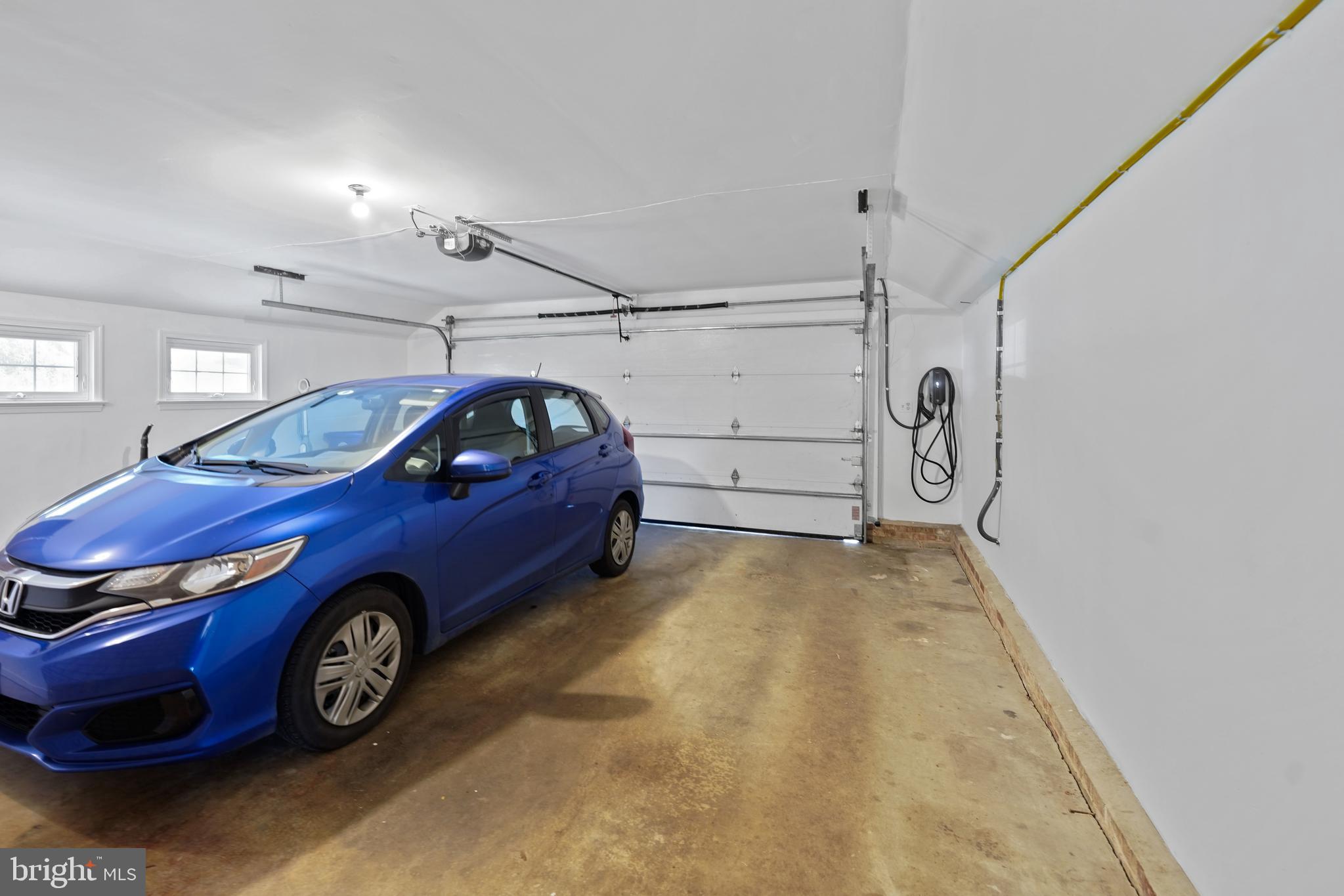 14400 Sandy Ridge Road Silver Spring, MD 20904 - Photo 49 of 62 Side-Load Two-Car Garage with Charging Station