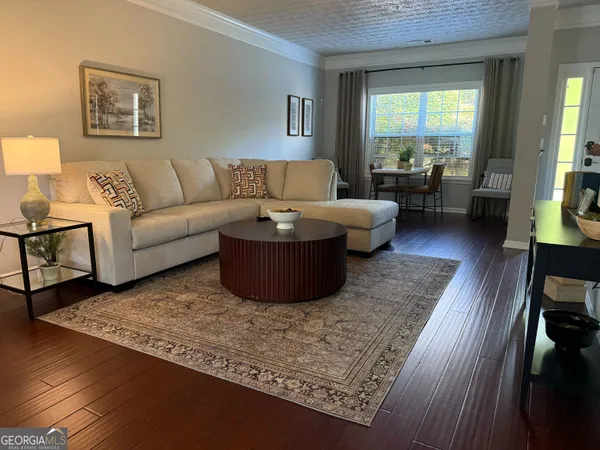 a living room with furniture and a couch