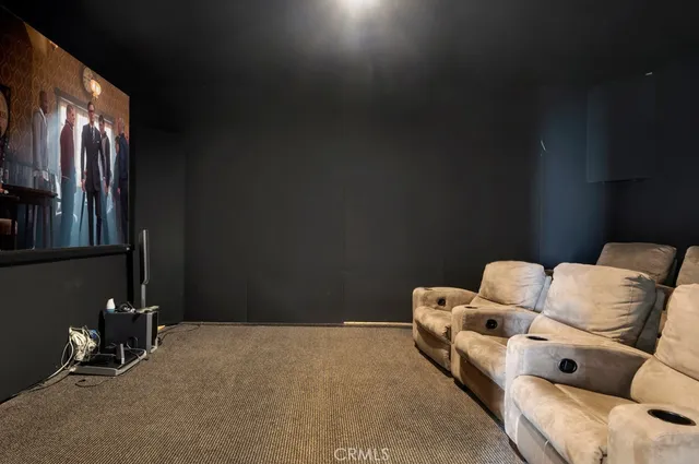 a view of a house with wooden floor and white walls