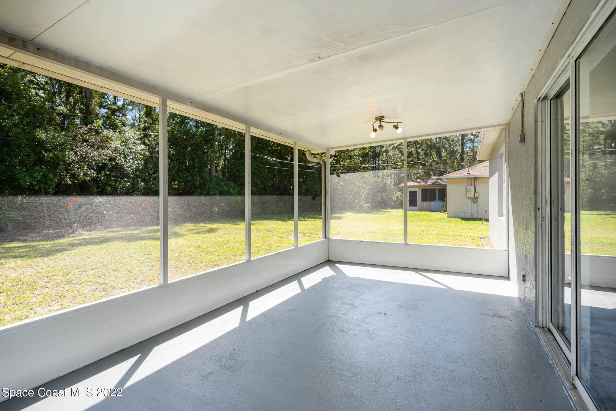 1572 Holbrook Road Northwest Palm Bay, FL 32907 - Photo 19 of 23 Back porch