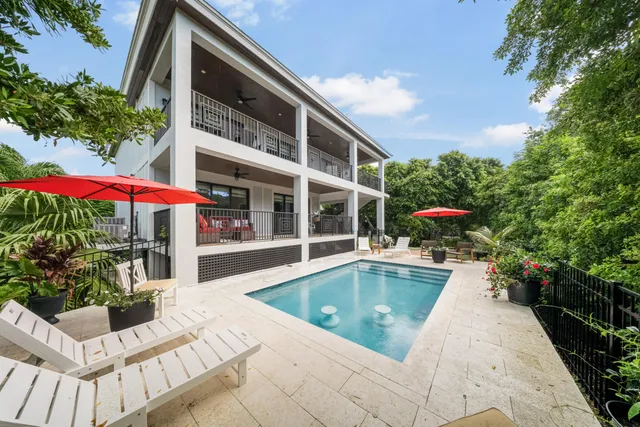 a view of a swimming pool with a patio